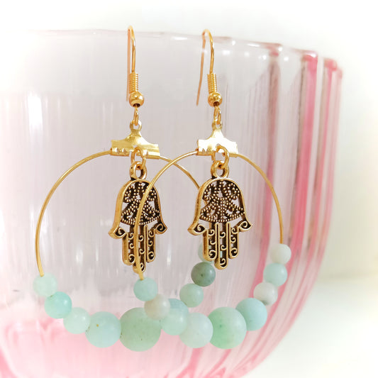 Amatsoniitti korvikset